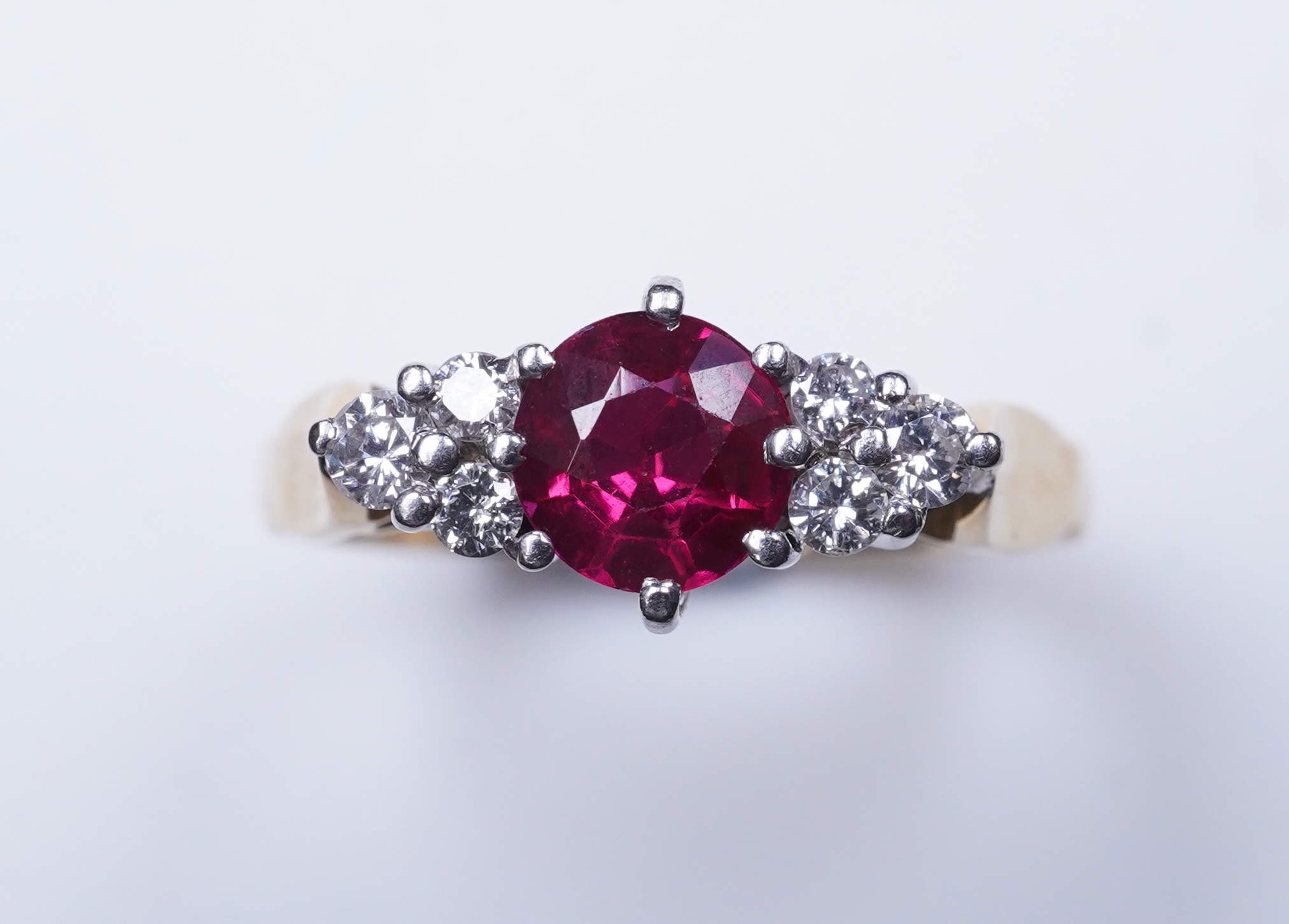 A synthetic ruby and diamond ring